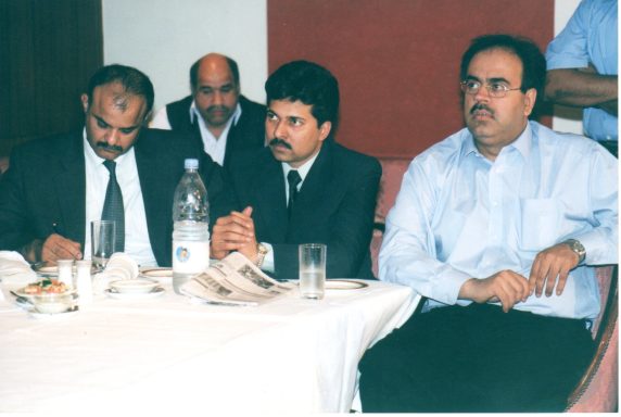Farhan Aslam, Editor of Daily Ausaf, covering a London press conference with Dr Shahid Masood.