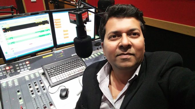 Muhammad Farhan Aslam presenting a music and entertainment show at Asian Sound Radio Manchester.