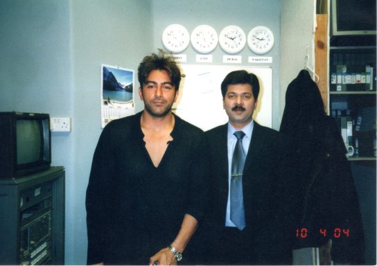 Muhammad Farhan Aslam with Pakistani film star Shaan Shahid outside the ARY TV studio.